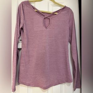 Purple top. Never worn. Tags on. Yoga/workout gear